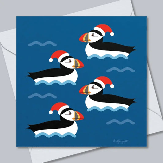 Festive Puffins On The Waves Greetings Card