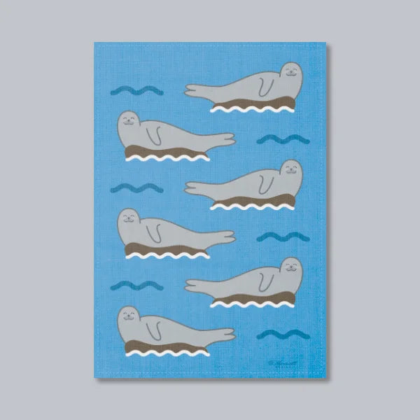Harbour Seals On Rocks Tea Towel
